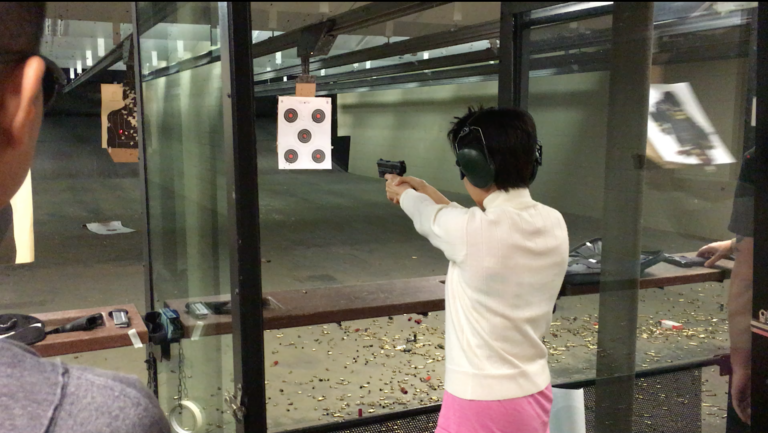 Sue Ping at shooting range Gun Ownership on the Rise for Asian-Americans