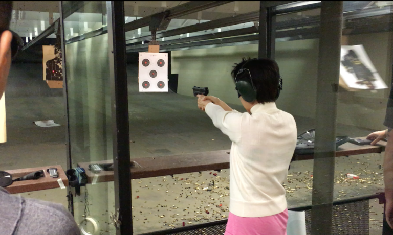 Sue Ping at shooting range Gun Ownership on the Rise for Asian-Americans