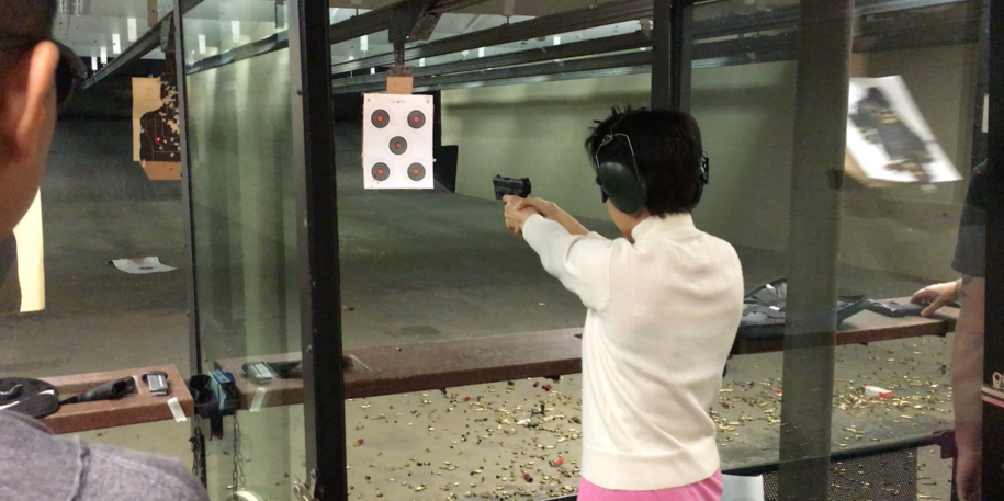 Sue Ping at shooting range Gun Ownership on the Rise for Asian-Americans